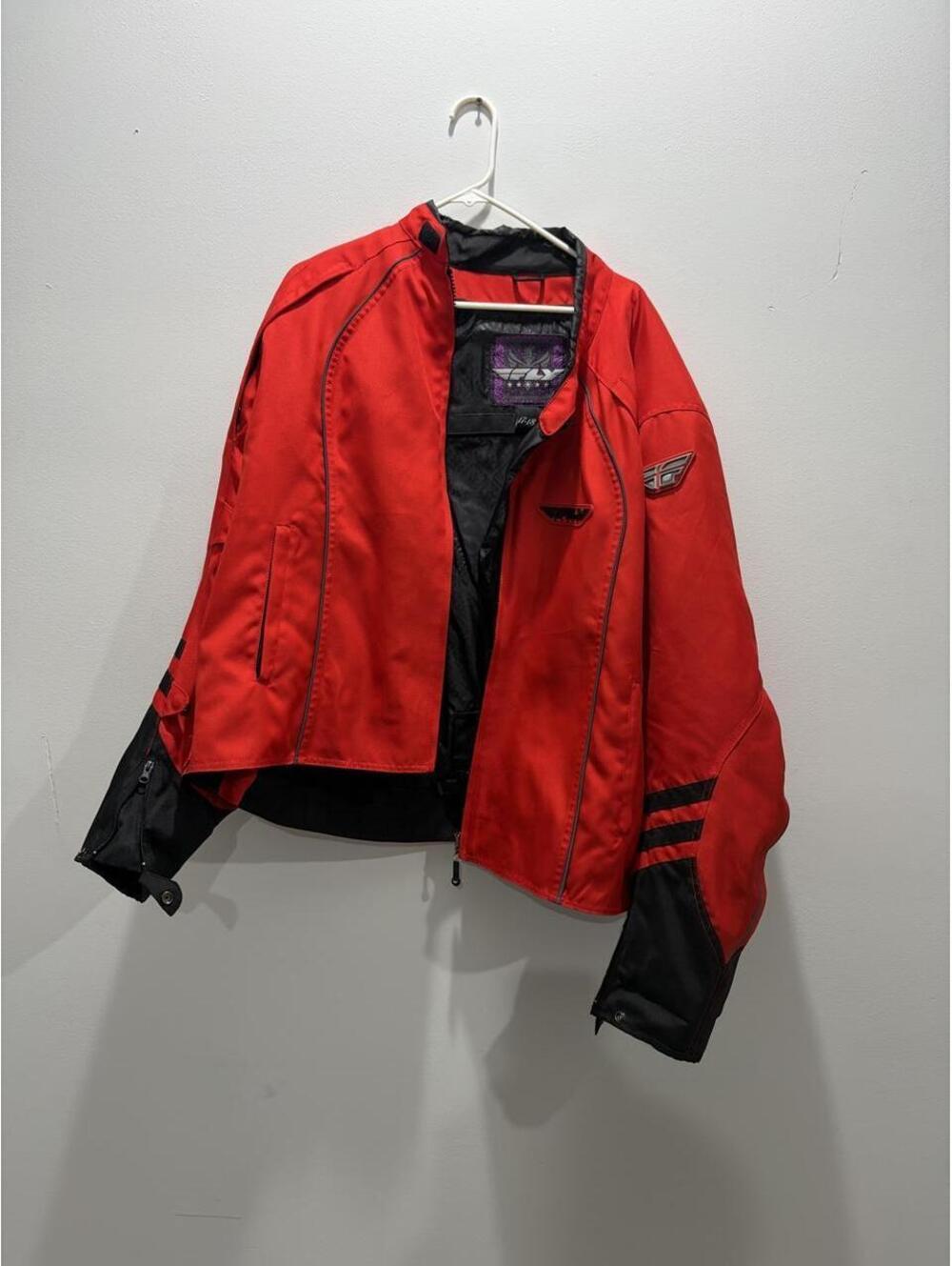 Fly Racing red & black jacket with black stripes on sleeves, size 17-18